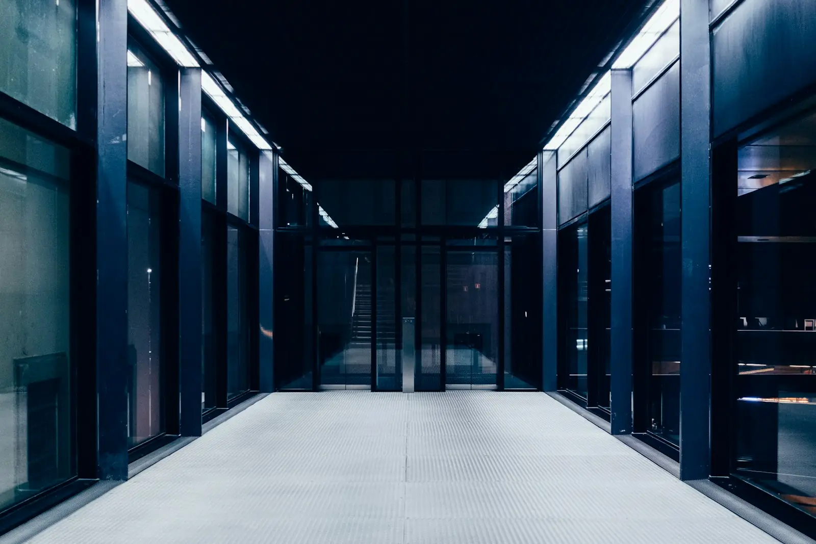 A corridor of server racks in a data center