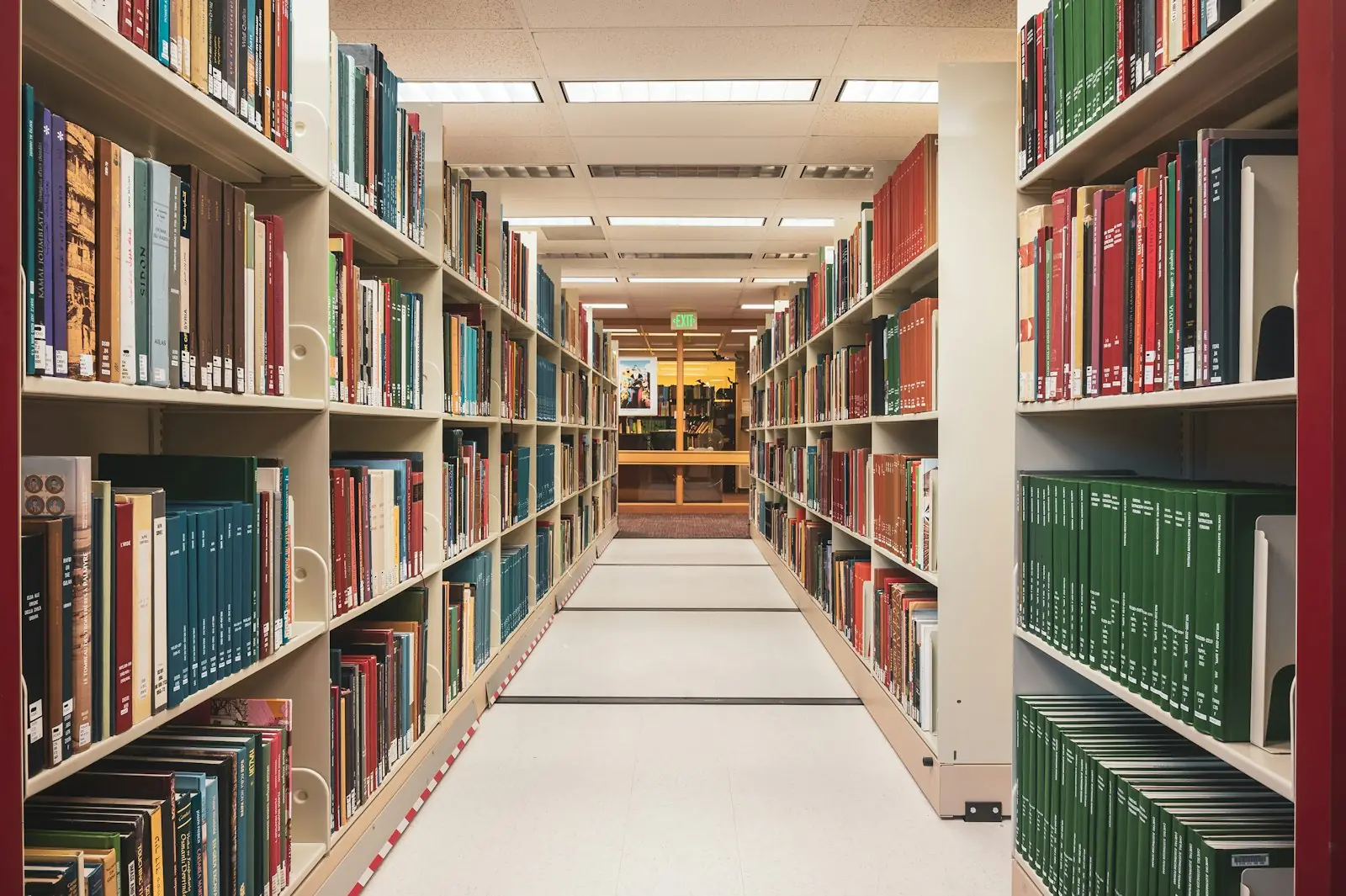 A long row of books in a library