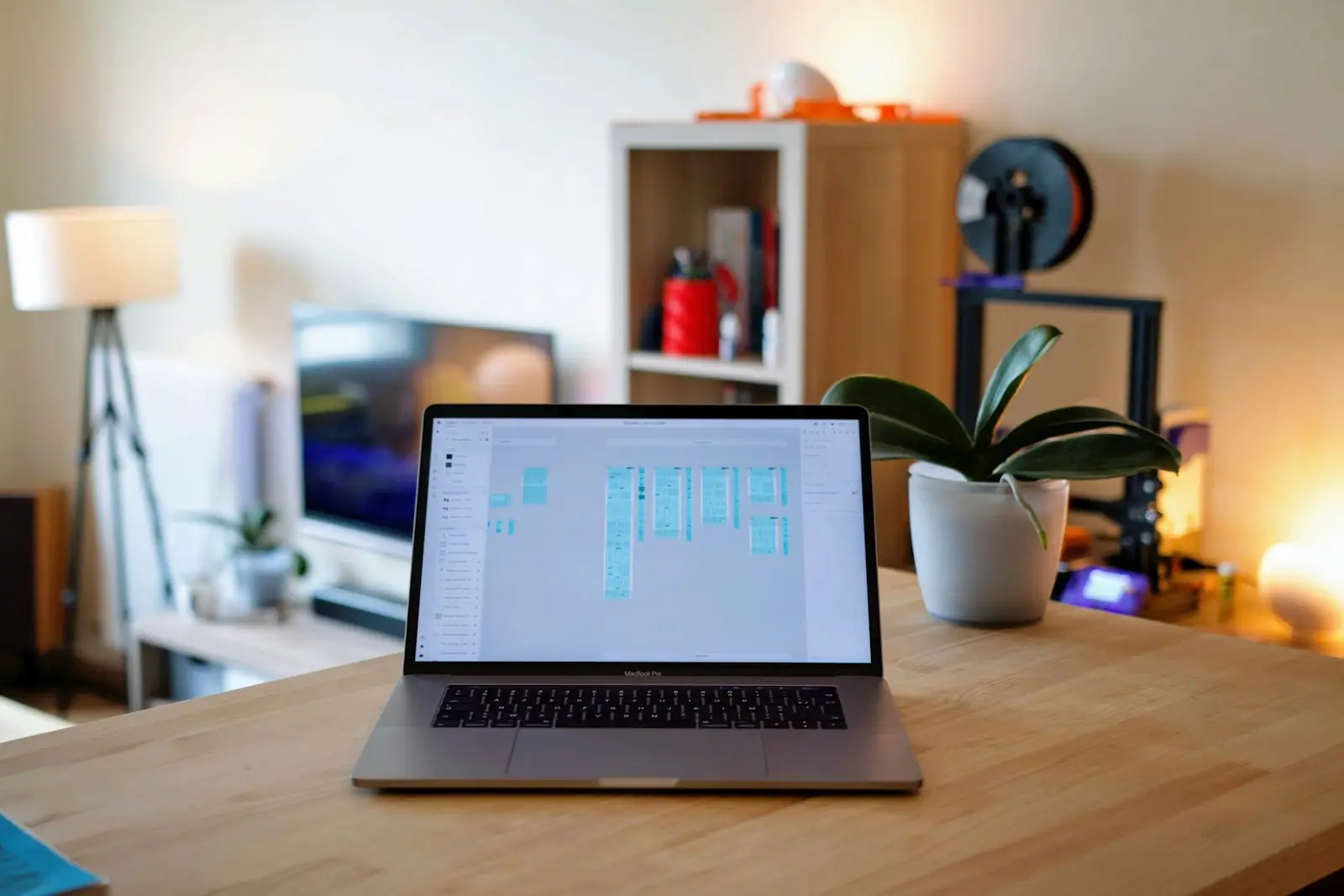 A laptop on a wooden desk